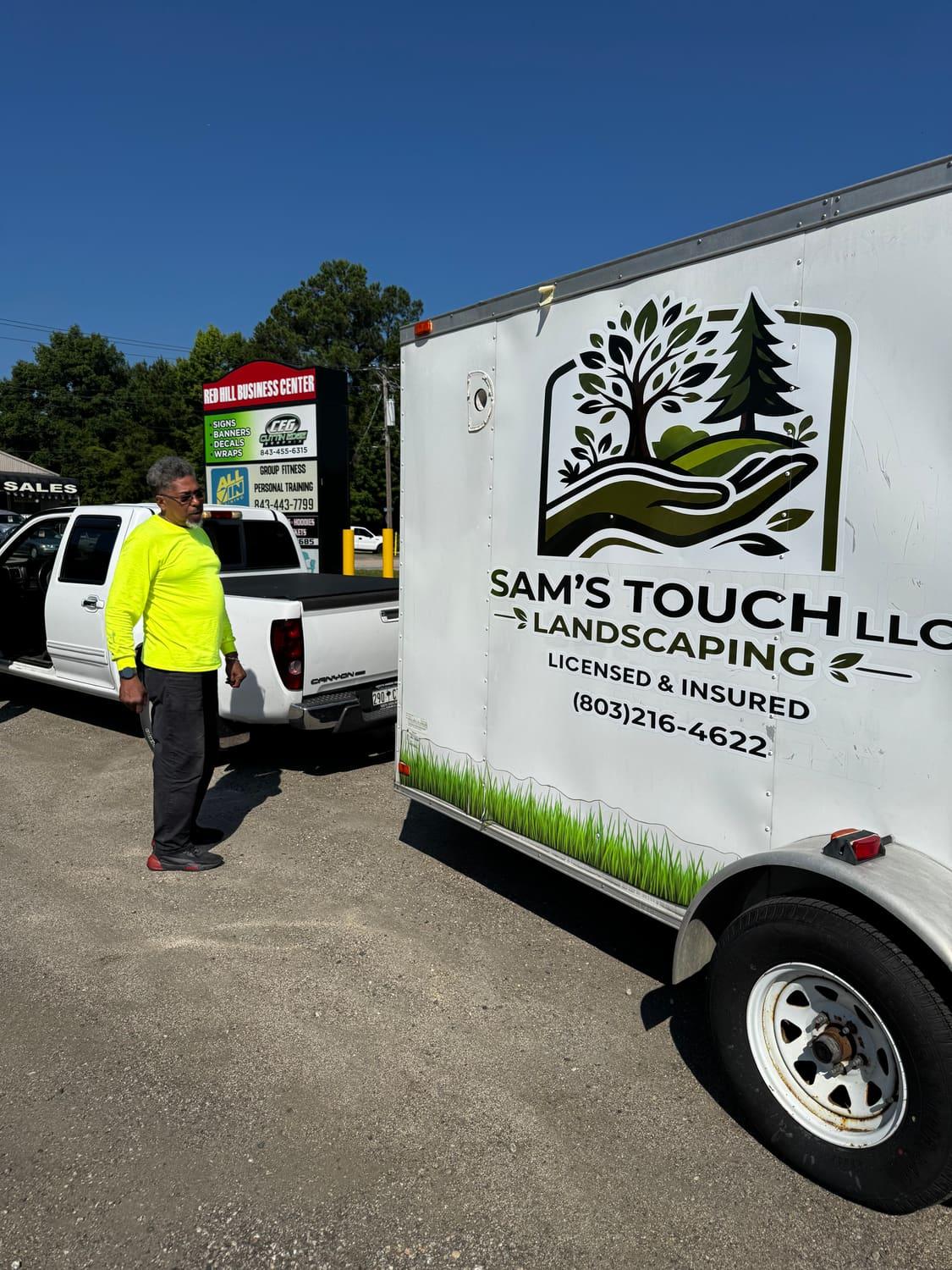 Sam's Touch Landscaping truck and equipment trailer